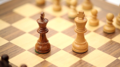 Playing Black Emirhan Tarlabasi won the game without making any move against Russian chess player Daniil Golikov. His opponent didn't come in time and lost due to zero tolerance rule. That game between the two leaders was played in the first board.